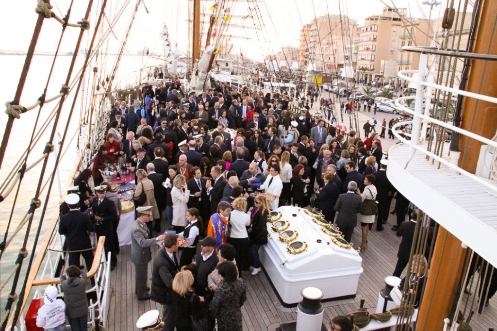 Up to 100 people mingle on deck